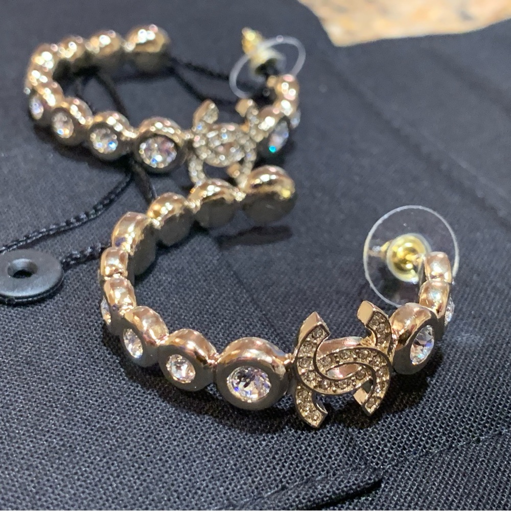 Absolutely stunning authentic Chanel hoops with cc logo, crystals . Must have!